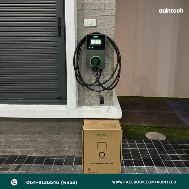 ผลงานติดตั้ง Autel MaxiCharger AC Wallbox 22kW สีเทาเข้ม จอ touch screen ดีไซน์สวย ทันสมัย พร้อมระบบป้องกันไฟรั่วในตัว สายเข้าด้านหลังตัวเครื่อง ด้านหน้าไม่เห็นท่อร้อยสายและตู้เบรกเกอร์ โดย Auintech